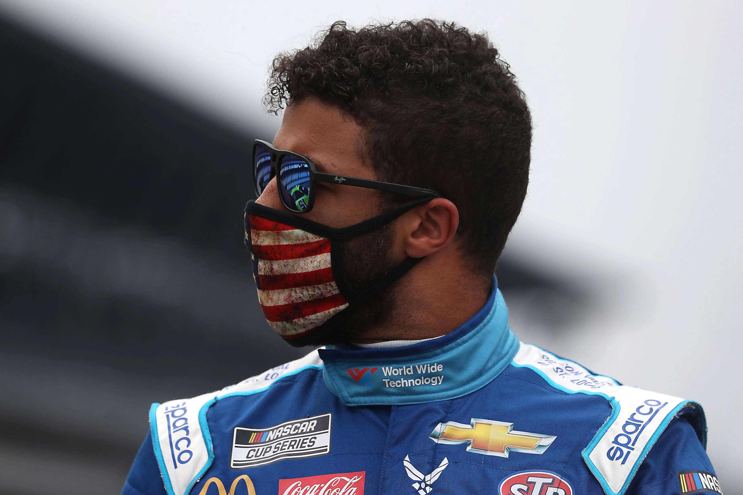 PHOTO: Bubba Wallace, driver of the #43 World Wide Technology Chevrolet, walks the grid prior to the NASCAR Cup Series Big Machine Hand Sanitizer 400 Powered by Big Machine Records at Indianapolis Motor Speedway on July 5, 2020 in Indianapolis.