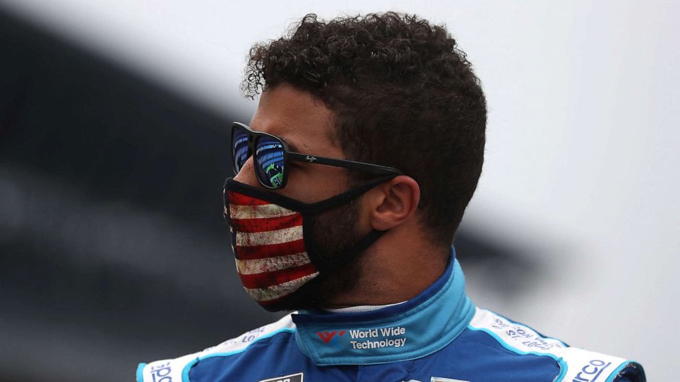 PHOTO: Bubba Wallace, driver of the #43 World Wide Technology Chevrolet, walks the grid prior to the NASCAR Cup Series Big Machine Hand Sanitizer 400 Powered by Big Machine Records at Indianapolis Motor Speedway on July 5, 2020 in Indianapolis.