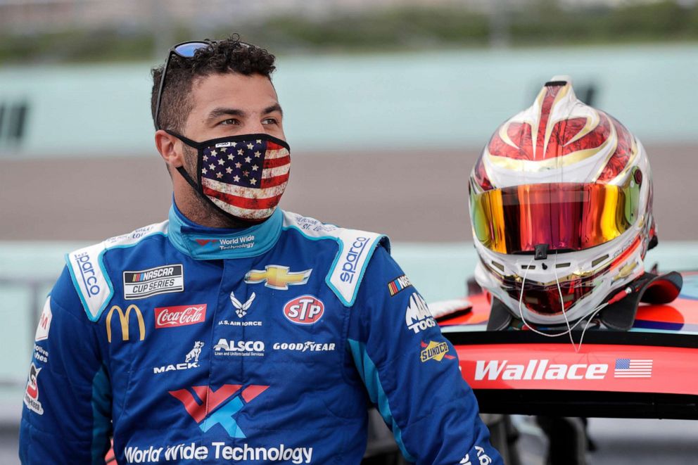 PHOTO: Bubba Wallace waits for the start of a NASCAR Cup Series auto race, June 14, 2020, in Homestead, Fla.