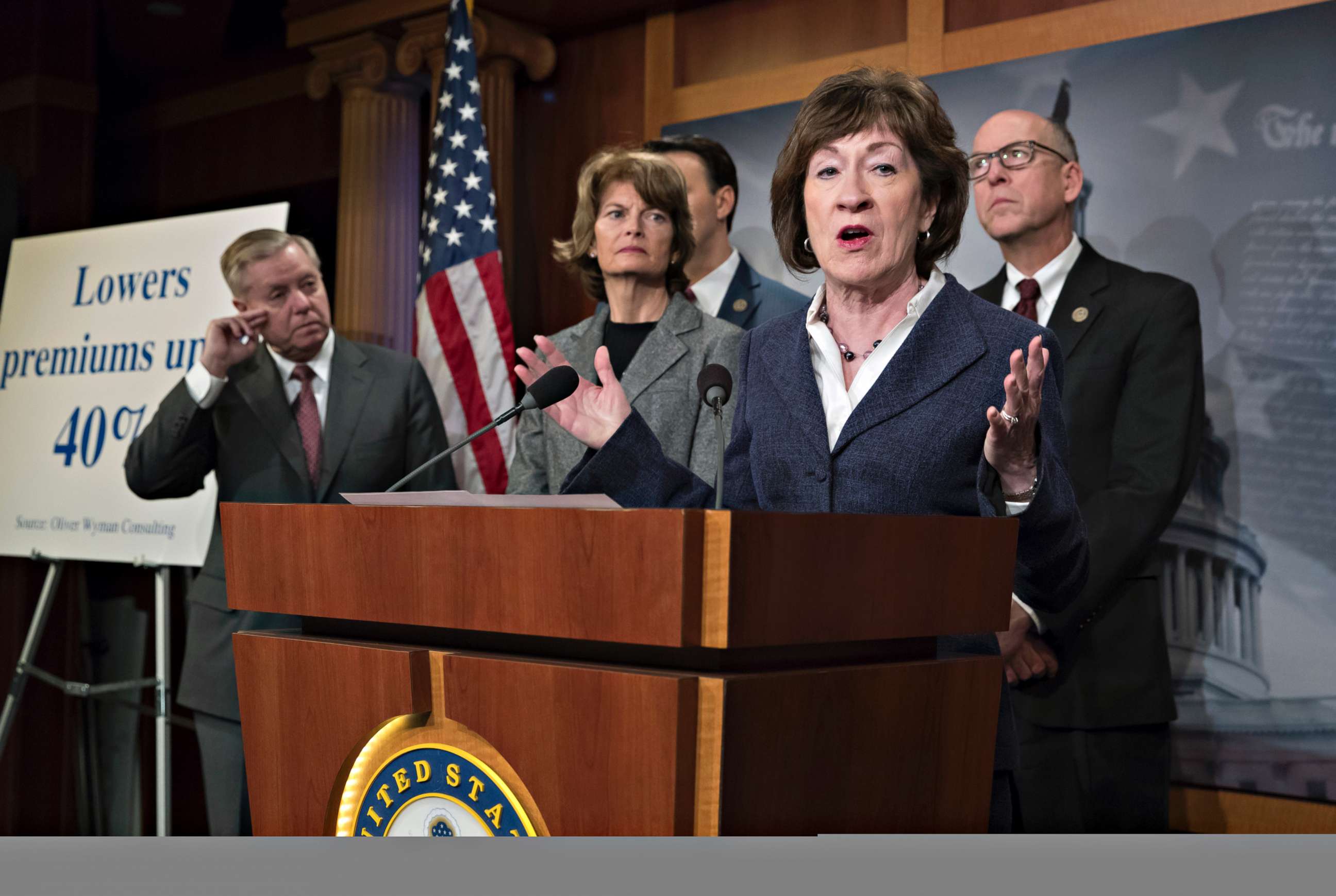 Sen. Susan Collins, joined, from left, by Sen. Lindsey Graham, Lisa Murkowski, and Rep. Greg Walden, pushes for inclusion in the pending government spending bill of provisions to lower health insurance premiums on the Affordable Care Act marketplace.