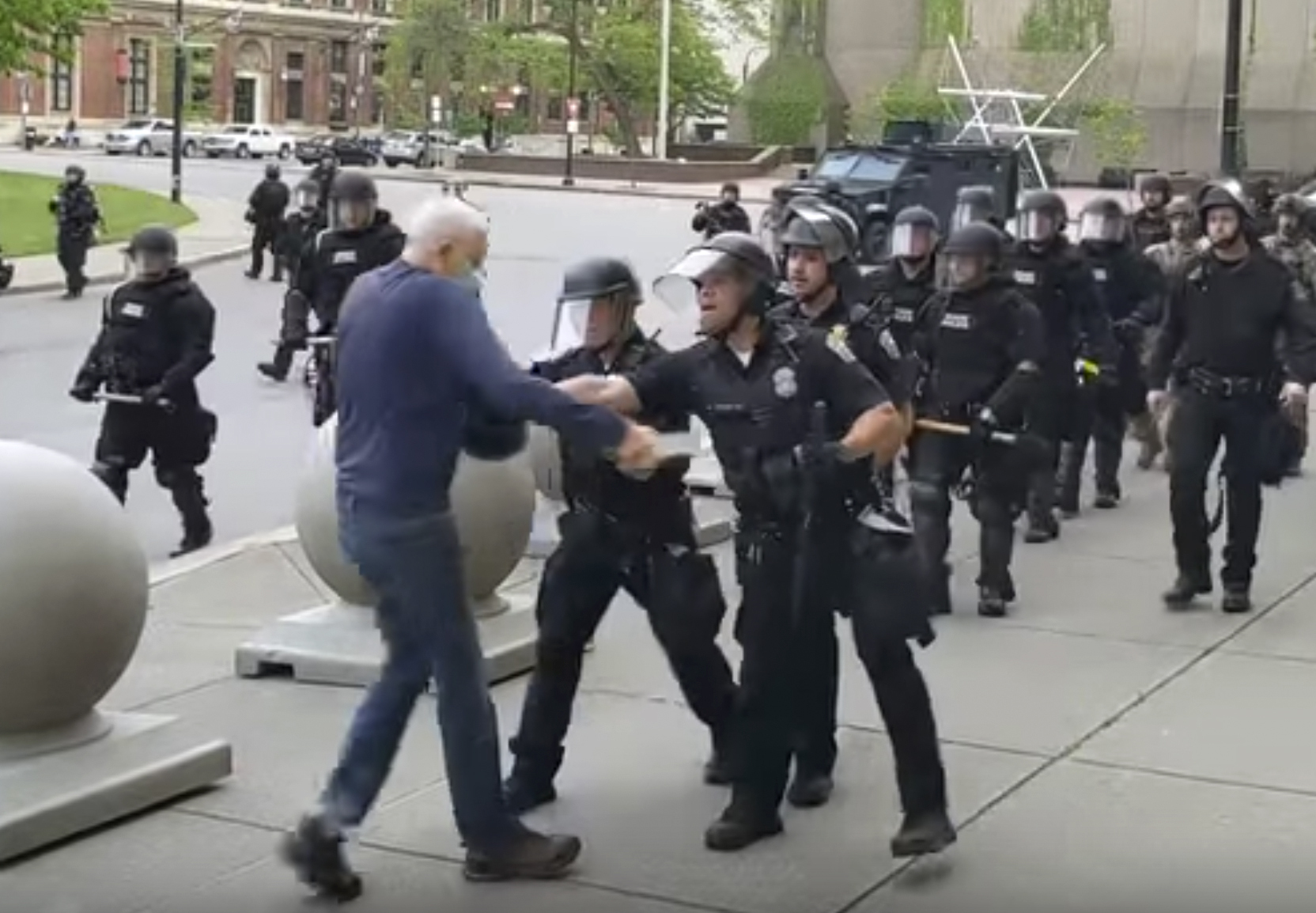 PHOTO: In this image from video provided by WBFO, a Buffalo police officer appears to shove a man who walked up to police Thursday, June 4, 2020, in Buffalo, N.Y.