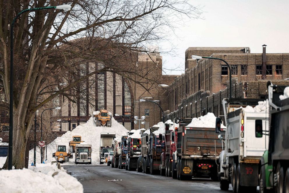 PHOTO: Trucks line up to drop off snow in front of Central Terminal following a winter storm in Buffalo, New York, Dec. 28, 2022.