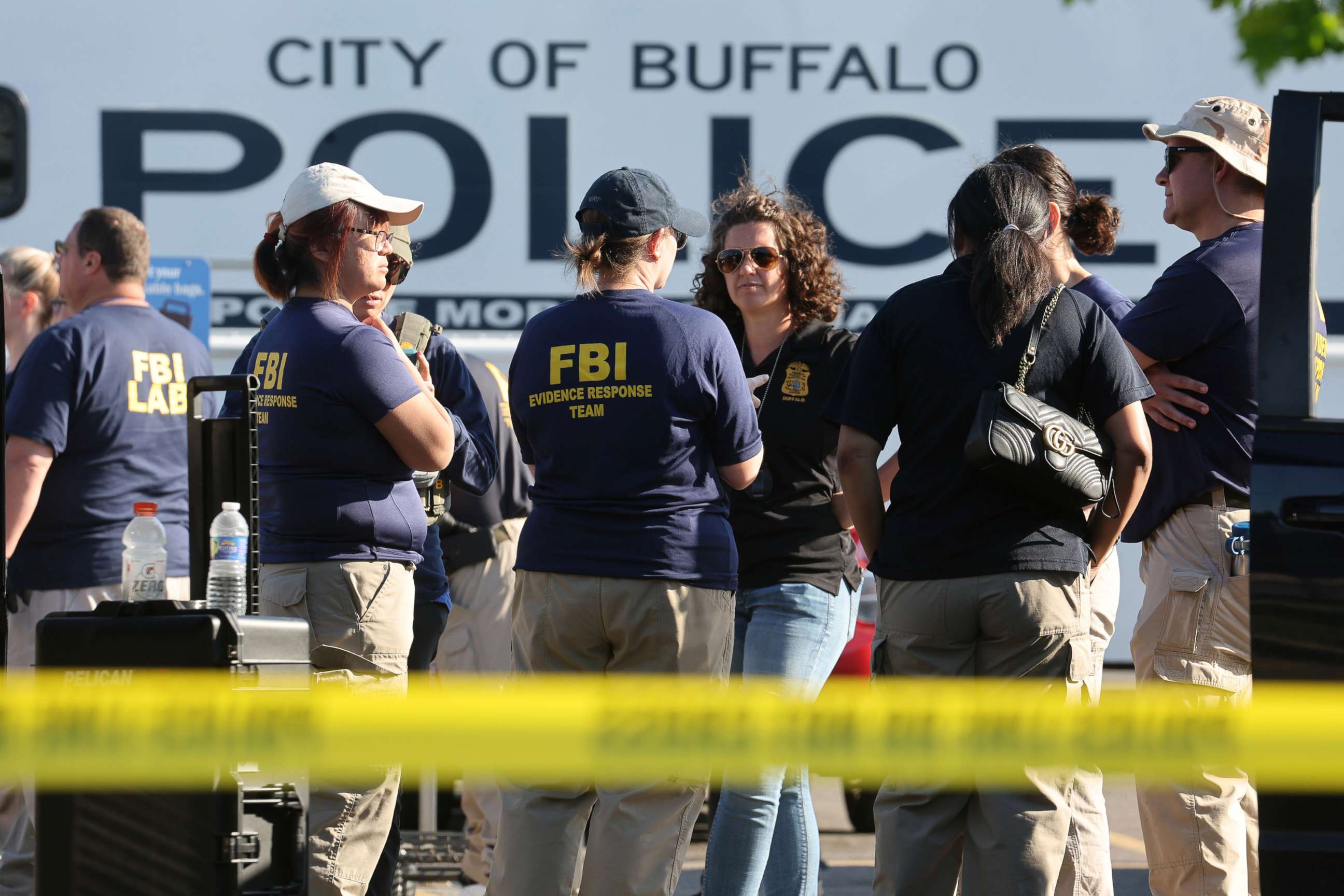 PHOTO: Police and FBI agents continue their investigation of the shootings at Tops market that killed 10 people on May 15, 2022 in Buffalo, New York.