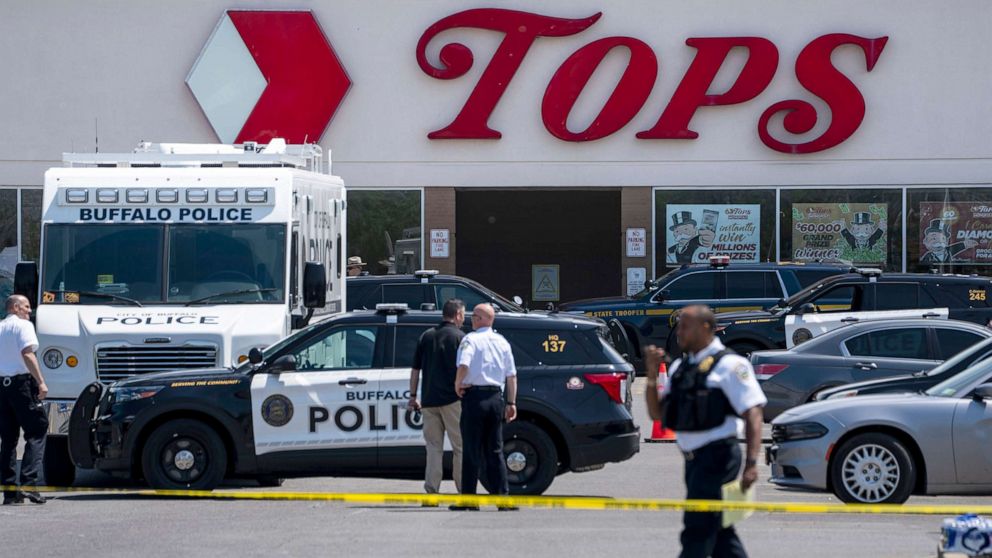 PHOTO: In this May 15, 2022, file photo, law enforcement officials respond to the scene of a mass shooting at Tops Friendly Market at Jefferson Avenue and Riley Street in Buffalo, N.Y.