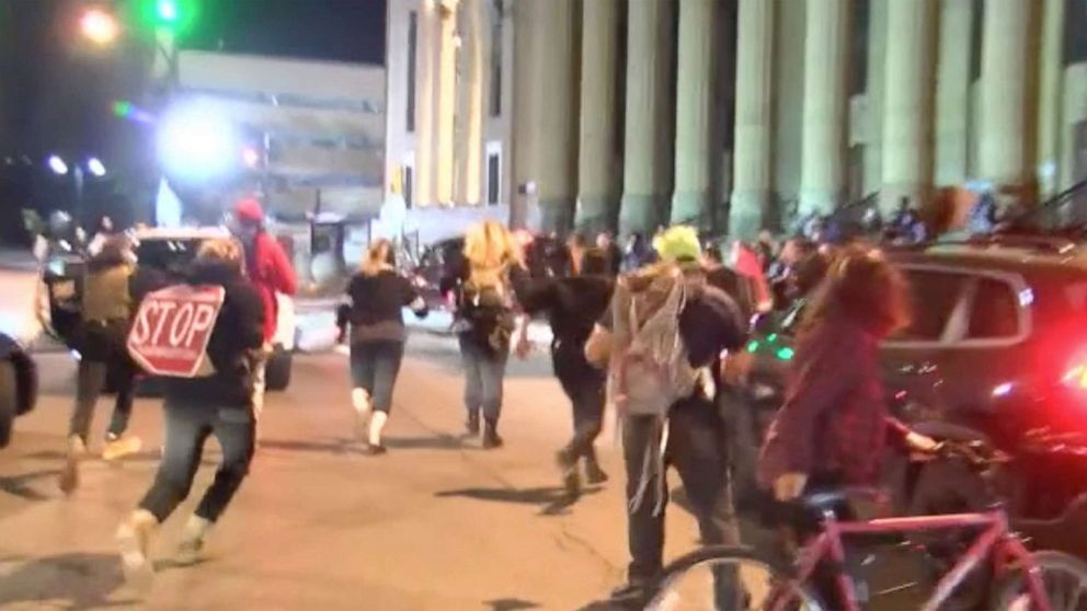 PHOTO: In this screen grab from a video, protesters run after a truck after sped through a crowd and hit a person during a protest outside City Hall in Buffalo, NY., Sept. 23, 2020.