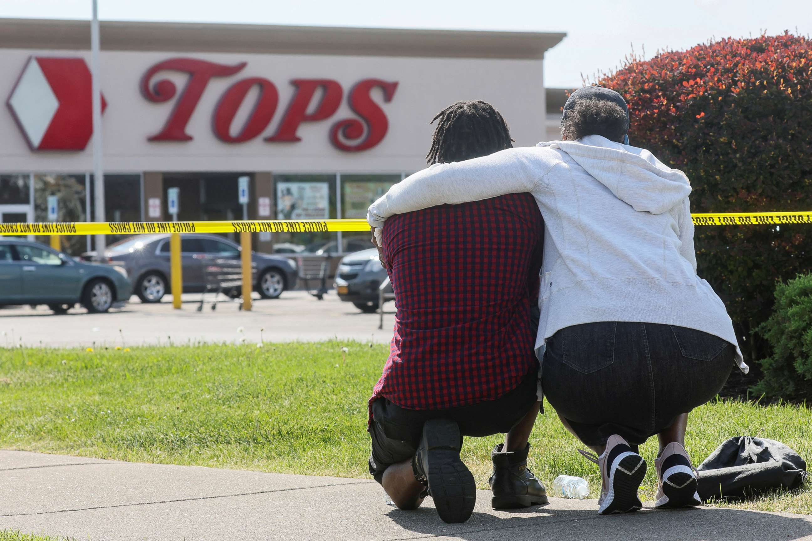 PHOTO: Mourners react while attending a vigil for victims of the shooting at a TOPS supermarket in Buffalo, NY, May 15, 2022.