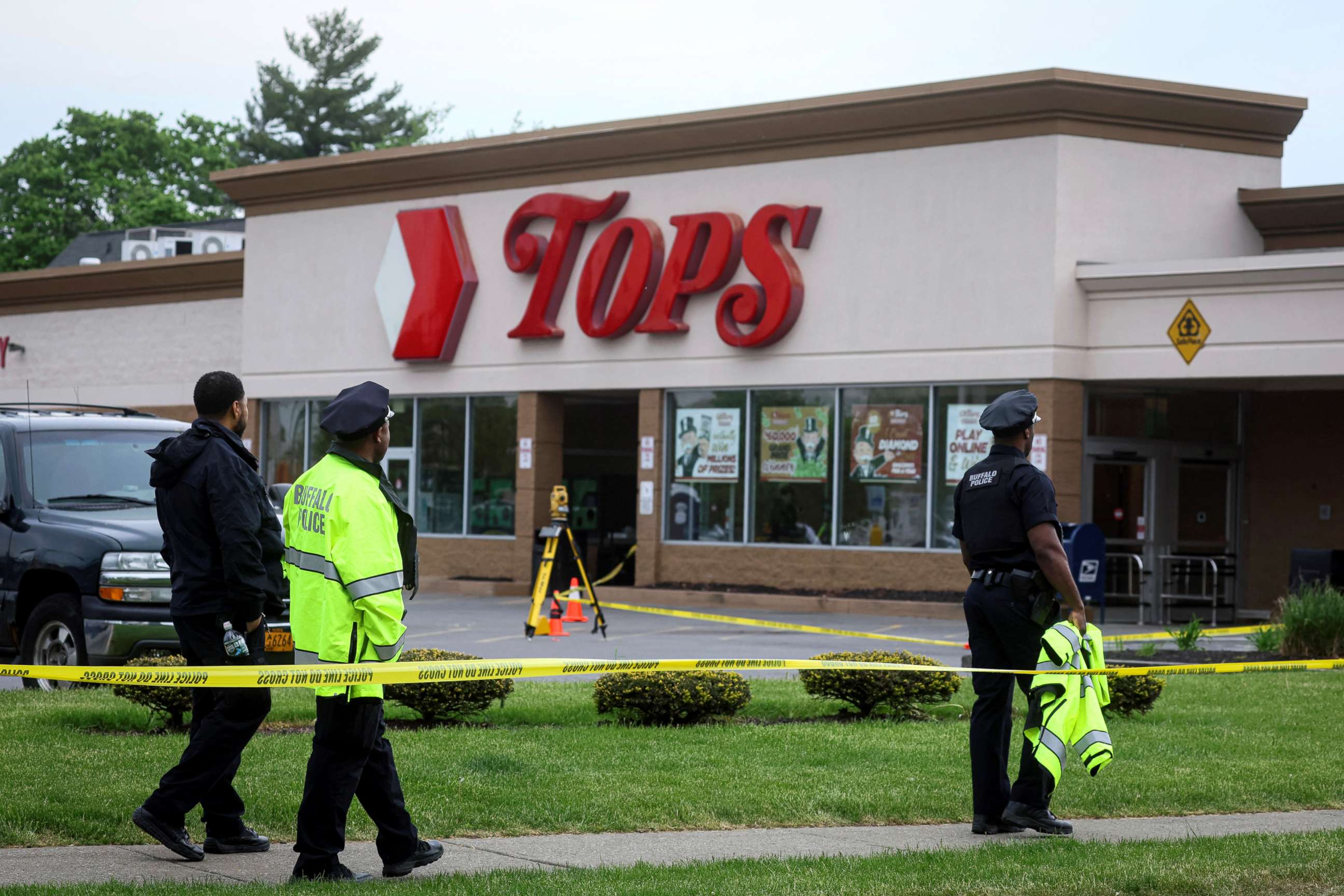PHOTO: Members of the Buffalo Police department work at the scene of a shooting at a Tops supermarket in Buffalo, New York, May 16, 2022.