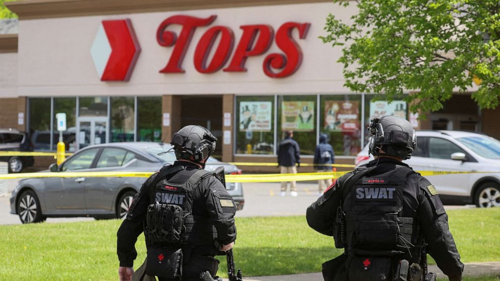 PHOTO: Members of the Buffalo Police Department work at the scene of a shooting at a Tops supermarket in Buffalo, N.Y., May 17, 2022.