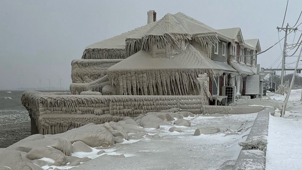 PHOTO: Hoak's restaurant is covered in ice from the spray of Lake Erie waves during a winter storm that hit the Buffalo region, Dec. 24, 2022 in Hamburg, New York.