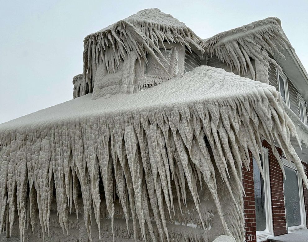 Photo: Hawk's restaurant is covered in ice from crashing waves on Lake Erie during a winter storm in Hamburg, NY, December 24, 2022.