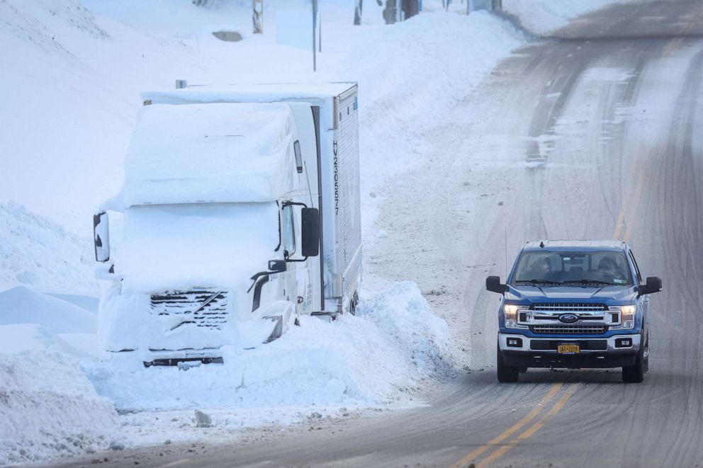 PHOTO: Vehicles are left stranded on the road following a winter storm that hit the Buffalo region in Amherst, New York, Dec. 25, 2022.