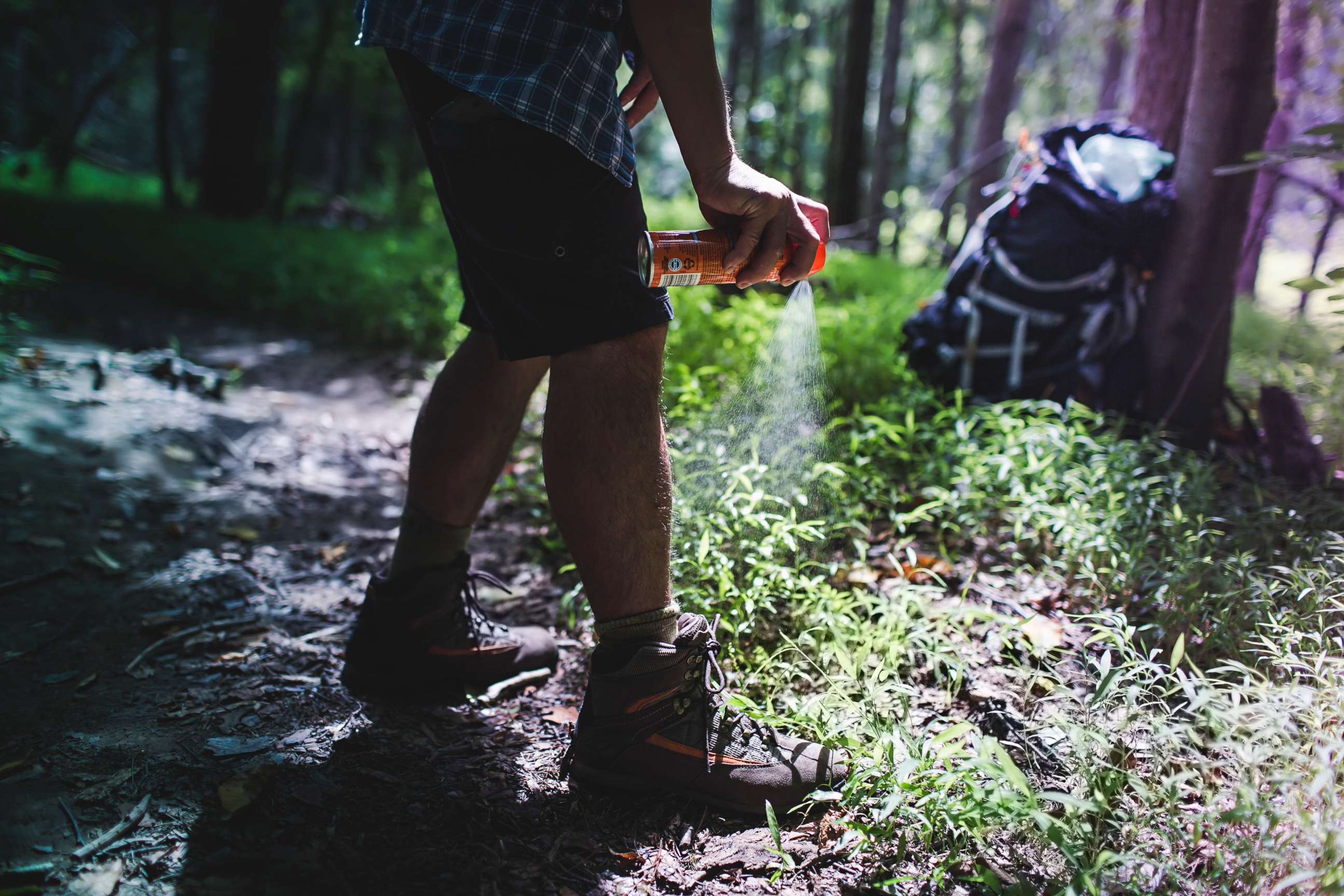 PHOTO: A hiker sprays insect repellent in this undated stock photo.