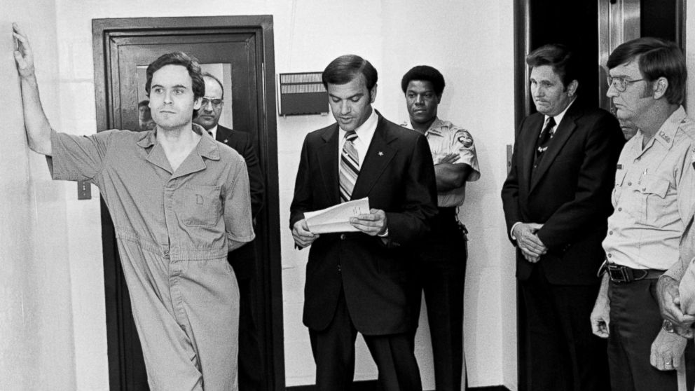 PHOTO: Suspected murderer Ted Bundy leans on the Leon County jail wall as an indictment charging him with the murders of two FSU coeds at the Chi Omega house is read by Leon County Sherriff Ken Katarsis in Tallahassee, Fla., July 27, 1978.