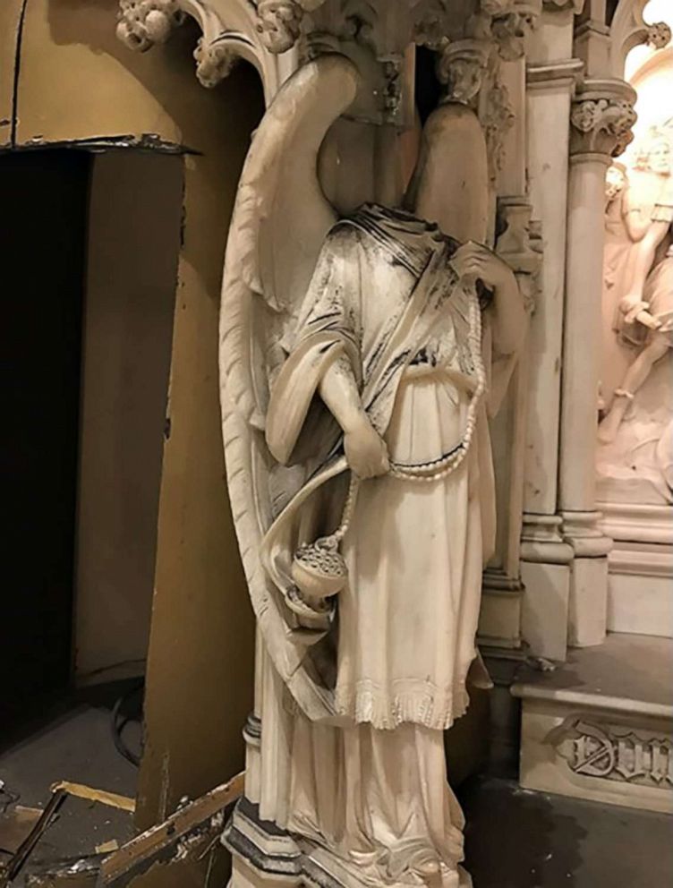 PHOTO: A sculpture of an angel had its head knocked off when someone broke into the Saint Augustine Roman Catholic Church in Brooklyn, N.Y., and stole a golden tabernacle, Friday, May 27, 2022.