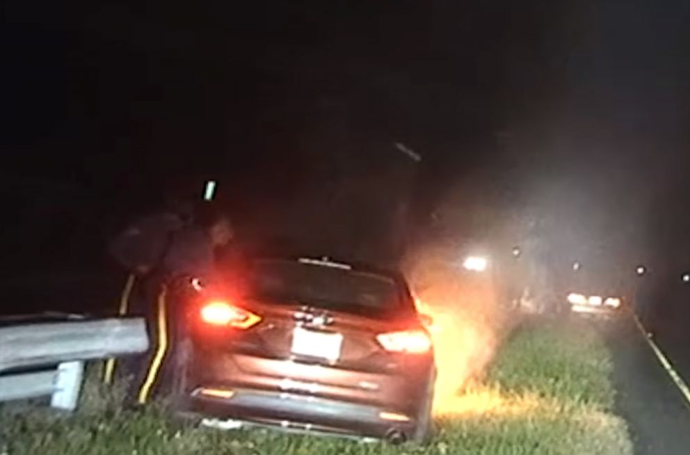 PHOTO: New Jersey State Troopers Thomas O'Connor and Christopher Warwick dragged an unconscious man from a burning car on the side of State Highway 42 in Camden County, Nov. 4, 2018.