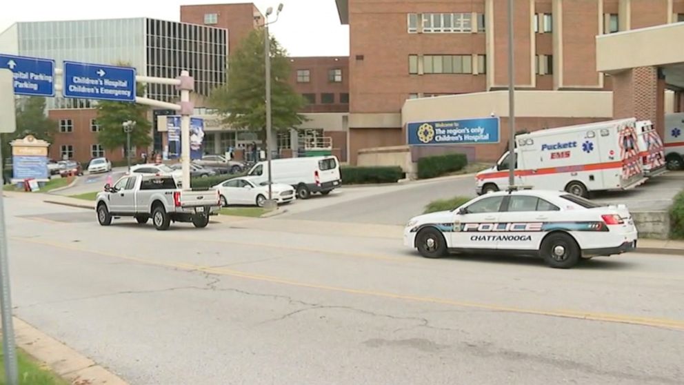 PHOTO: A Chattanooga, Tenn., police cruiser pulls up to the Children's Hospital at Erlanger along with a truck of family members after two people were killed in a school bus crash on Oct. 27, 2020.
