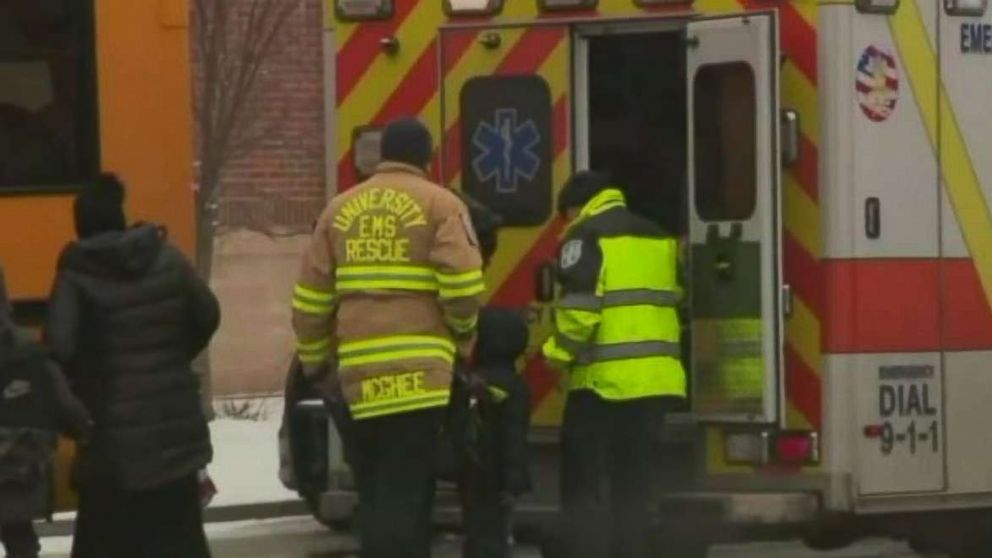 PHOTO: Paramedics assess a child after his bus, driven by Lisa Byrd rolled through an intersection and into a tree after she overdosed in Newark, N.J., on Wednesday, Feb. 21, 2019.