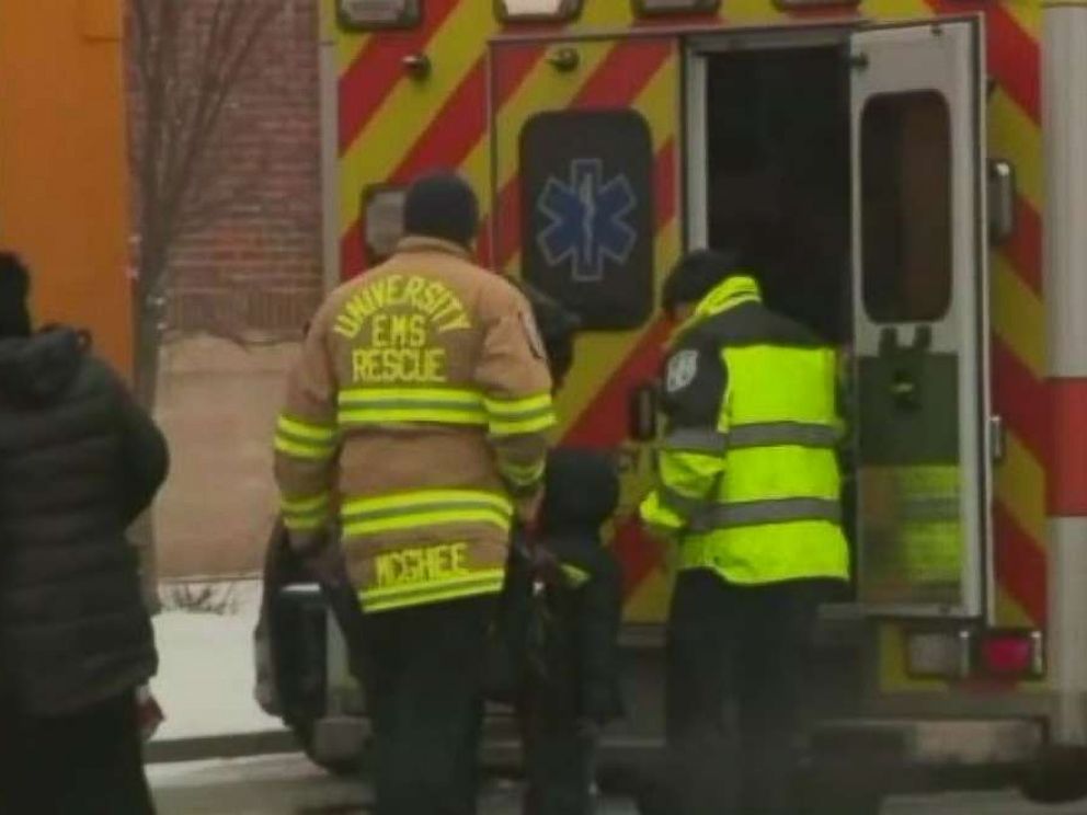 PHOTO: Paramedics assess a child after his bus, driven by Lisa Byrd rolled through an intersection and into a tree after she overdosed in Newark, N.J., on Wednesday, Feb. 21, 2019.