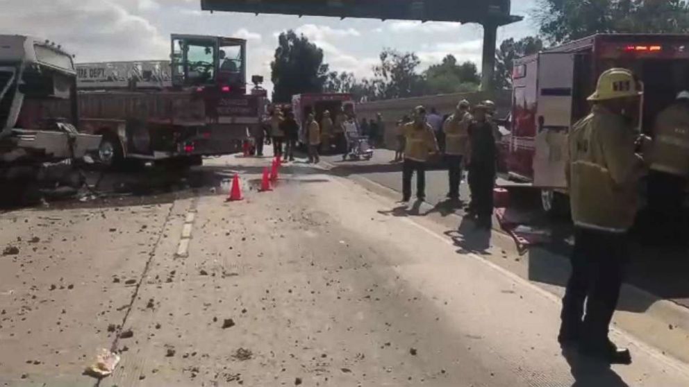 PHOTO: Twenty-five people were taken to the hospital after a bus crossed a freeway divider and hit a car.