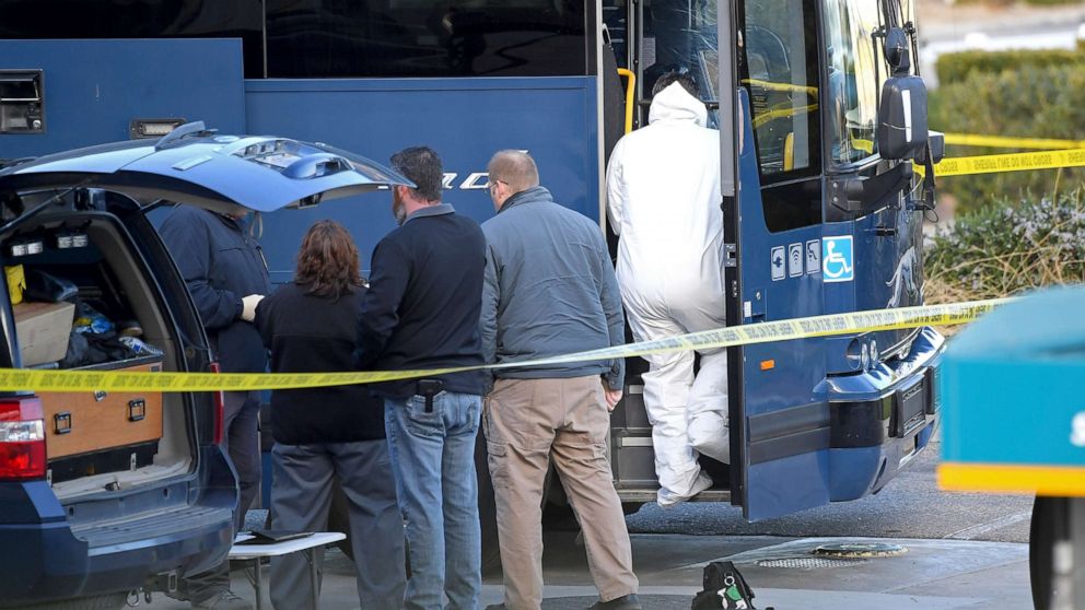 PHOTO: Investigators are seen outside of a Greyhound bus after a passenger was killed on board on Feb. 3, 2020 in Lebec, Calif.