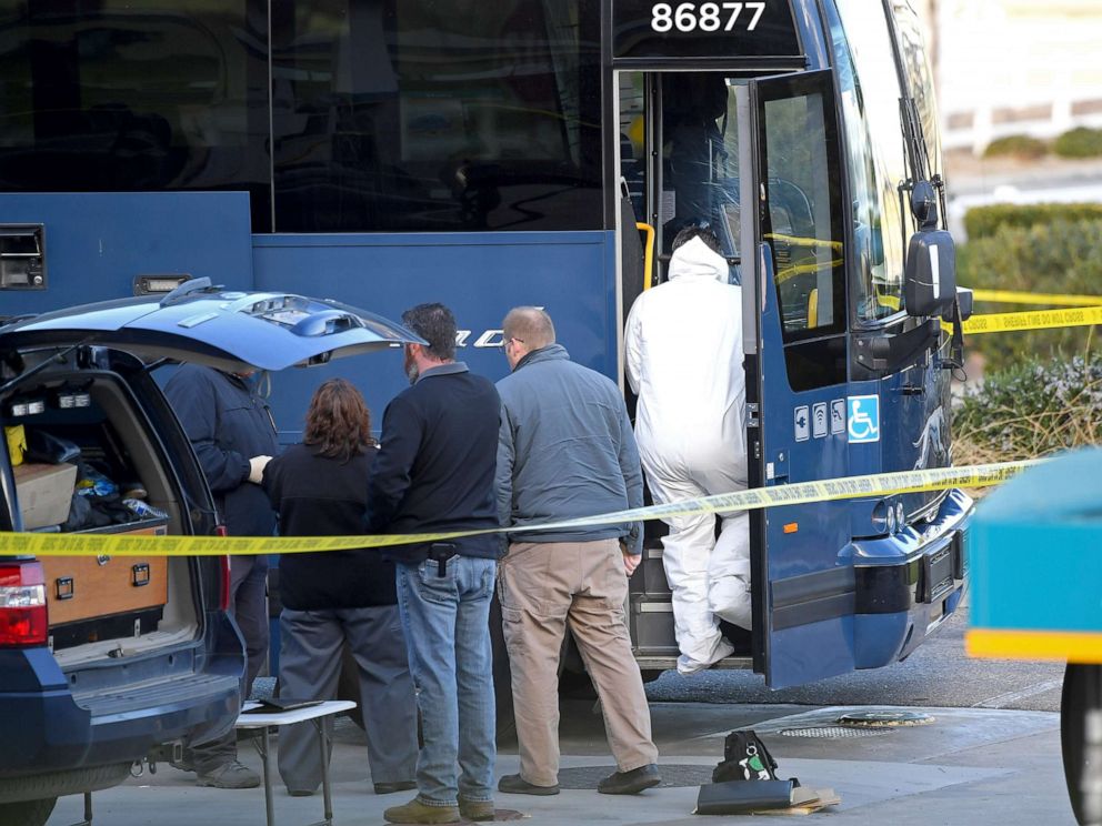 PHOTO: Investigators are seen outside of a Greyhound bus after a passenger was killed on board on Feb. 3, 2020 in Lebec, Calif.