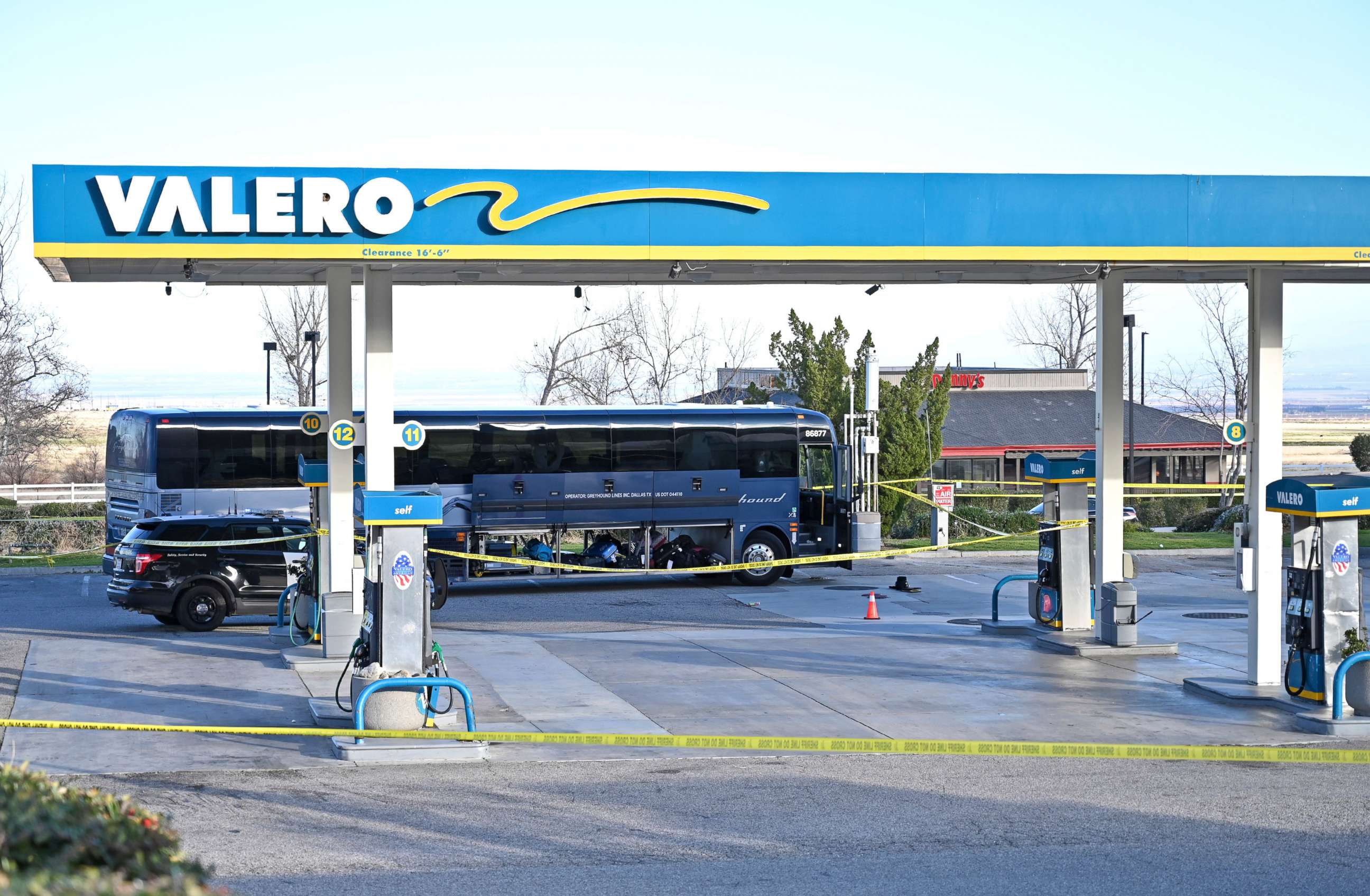 PHOTO: Investigators are seen outside of a Greyhound bus after a passenger was killed on board on Feb. 3, 2020 in Lebec, Calif.