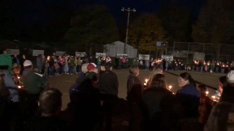 PHOTO: People attend a vigil for the young children killed at a bus stop in Rochester, Ind., Nov. 2, 2018.