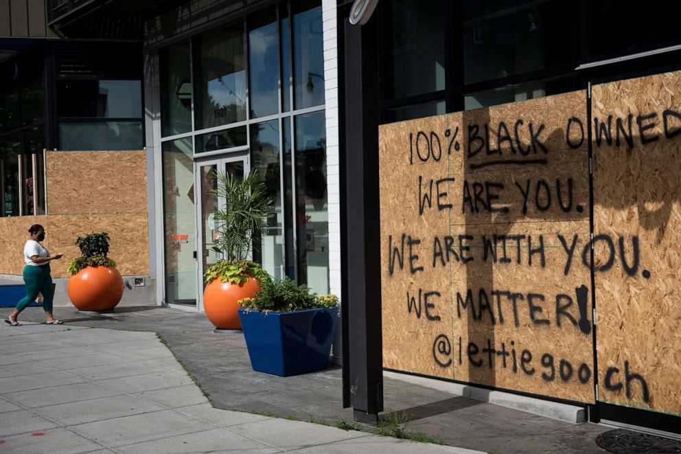 PHOTO: The store front of Lettie Gooch, one of the many black owned businesses near U Street, is seen boarded up, June 15, 2020, in Washington, D.C.