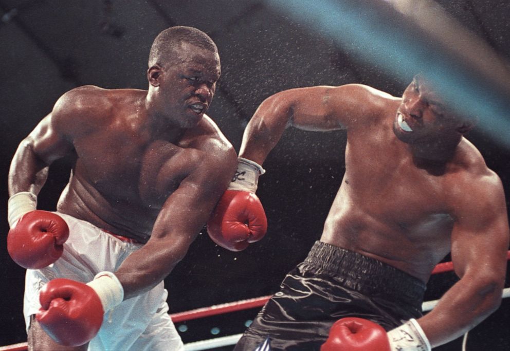 PHOTO: Challenger James "Buster" Douglas knocks out Mike Tyson in their heavyweight title fight in Tokyo, Feb. 11, 1990. 