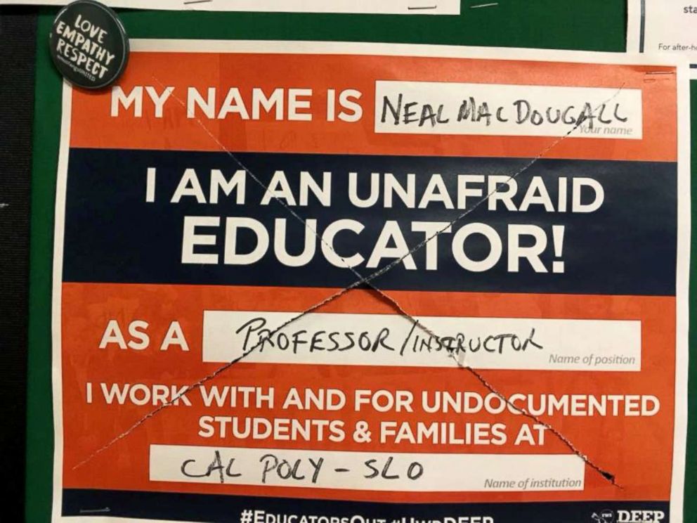 PHOTO: Dr. Neal MacDougall, a professor at the California Polytechnic State University's agribusiness department, took photos of defaced inclusion posters, as well as some racially-charged posters, near his office on campus.