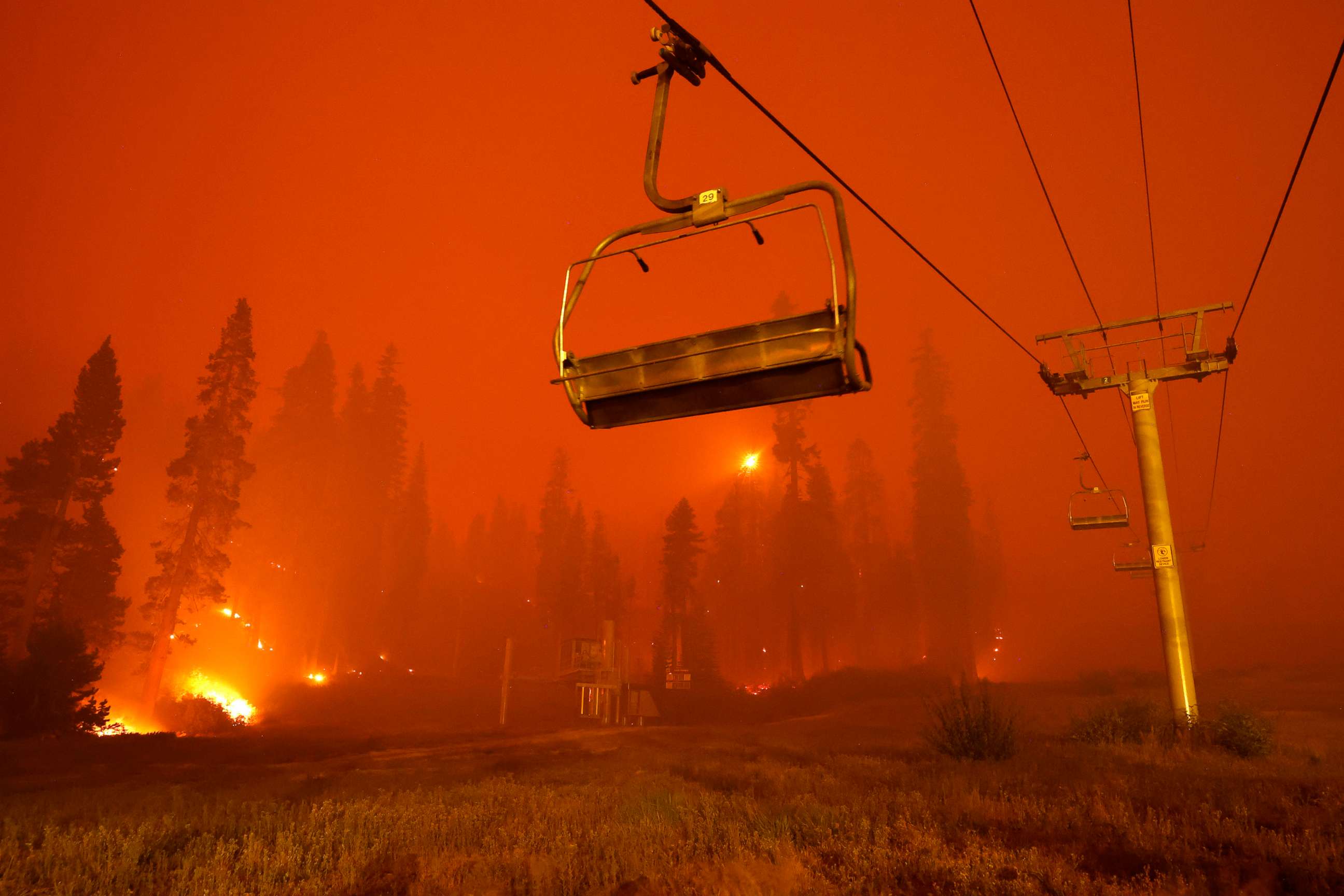 PHOTO: A chairlift at Sierra-at Tahoe ski resort sits idle as the Caldor Fire moves through the area on Aug. 30, 2021, in Twin Bridges, Calif.