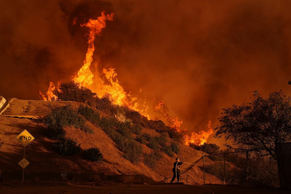 PHOTO: A firefighter battles the Palisades Fire in Mandeville Canyon, Jan. 11, 2025, in Los Angeles. 