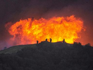 California fires live updates: Calmer winds help firefighters up containment