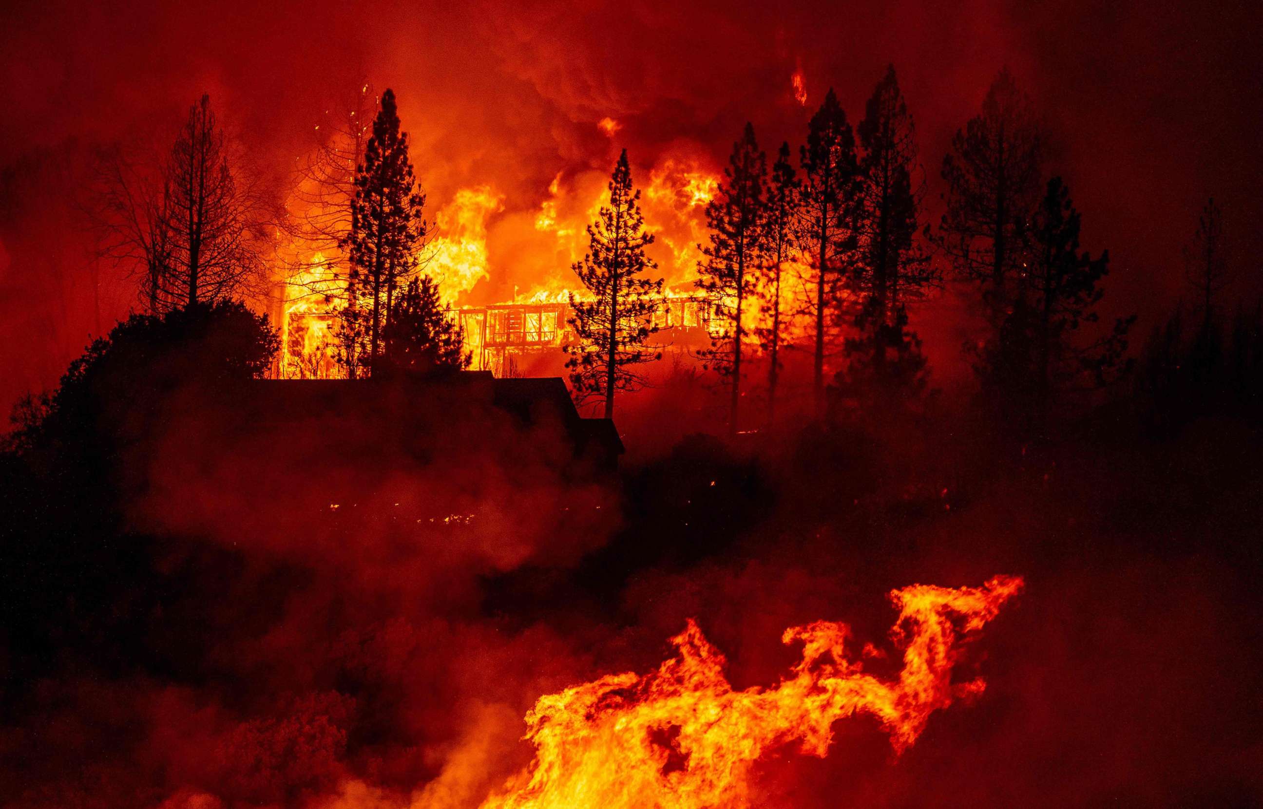 PHOTO: A home is engulfed in flames during the "Creek Fire" in the Tollhouse area of unincorporated Fresno County, Calif., Sept. 8, 2020.