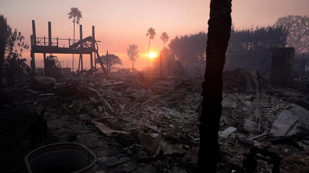 PHOTO: The sun rises after the Palisades Fire ravaged a neighborhood amid high winds in the Pacific Palisades neighborhood of Los Angeles, Jan. 9, 2025.