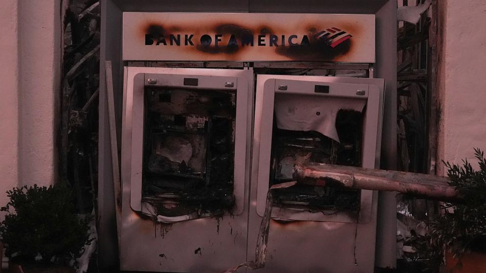 PHOTO: An ATM is damaged by the Palisades Fire at a Bank of America branch in the Pacific Palisades neighborhood of Los Angeles, Jan. 9, 2025.