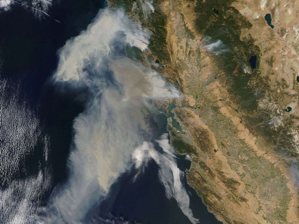 PHOTO: An image acquired by the Moderate Resolution Imaging Spectroradiometer (MODIS) instrument on NASA's Terra satellite shows smoke billowing from the fires in northern California, Oct. 9, 2017.