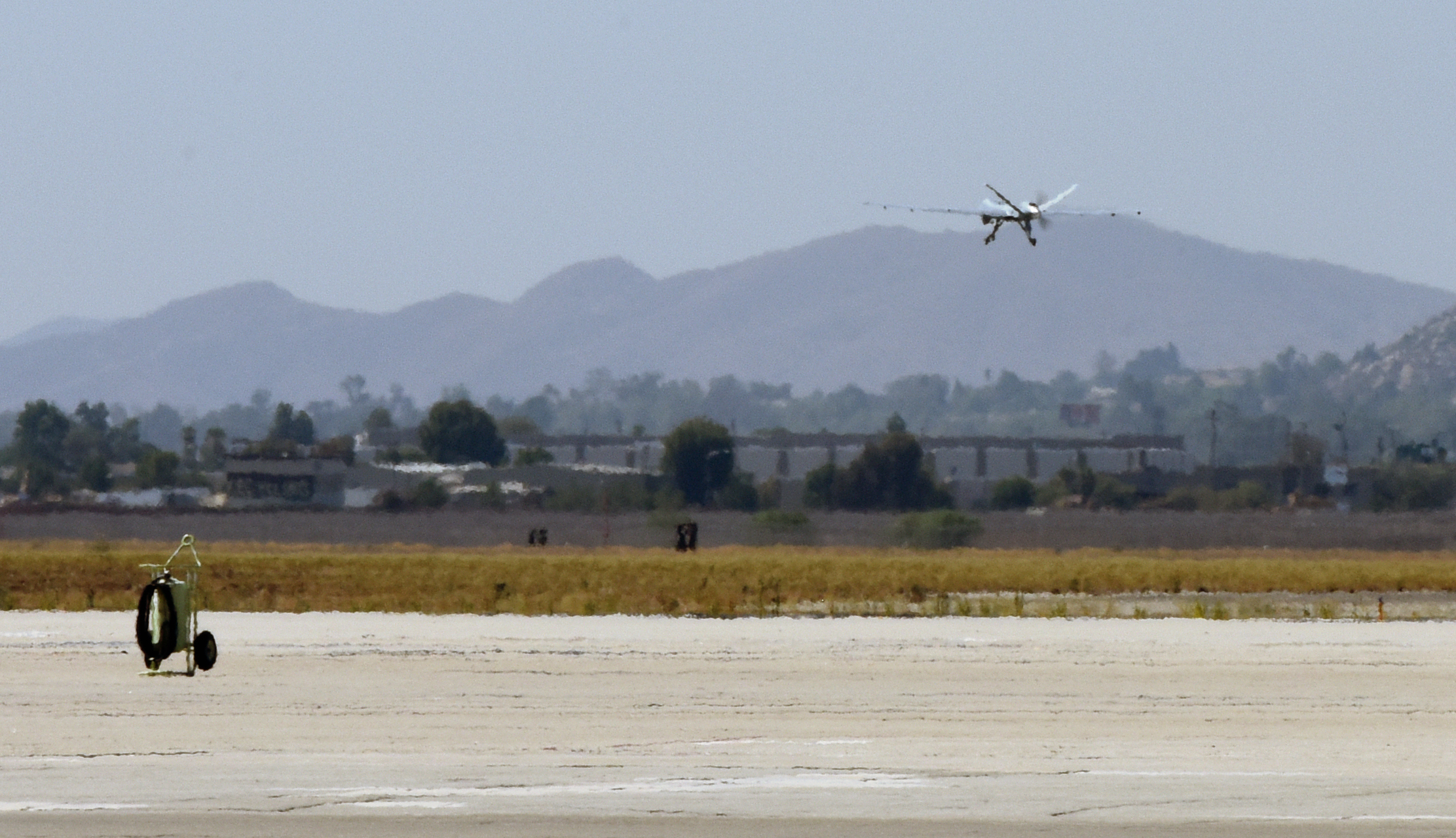 PHOTO: An MQ-9 Reaper remotely piloted aircraft takes off from March Air Reserve Base, California, Aug. 1, 2018, to provide visualization and mapping data to firefighters battling deadly fires in Northern California.