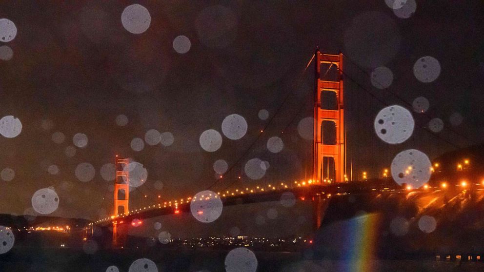 PHOTO: The Golden Gate Bridge is seen through a mix of rain and splashing bay water in Sausalito, Calif., Jan. 5, 2023.