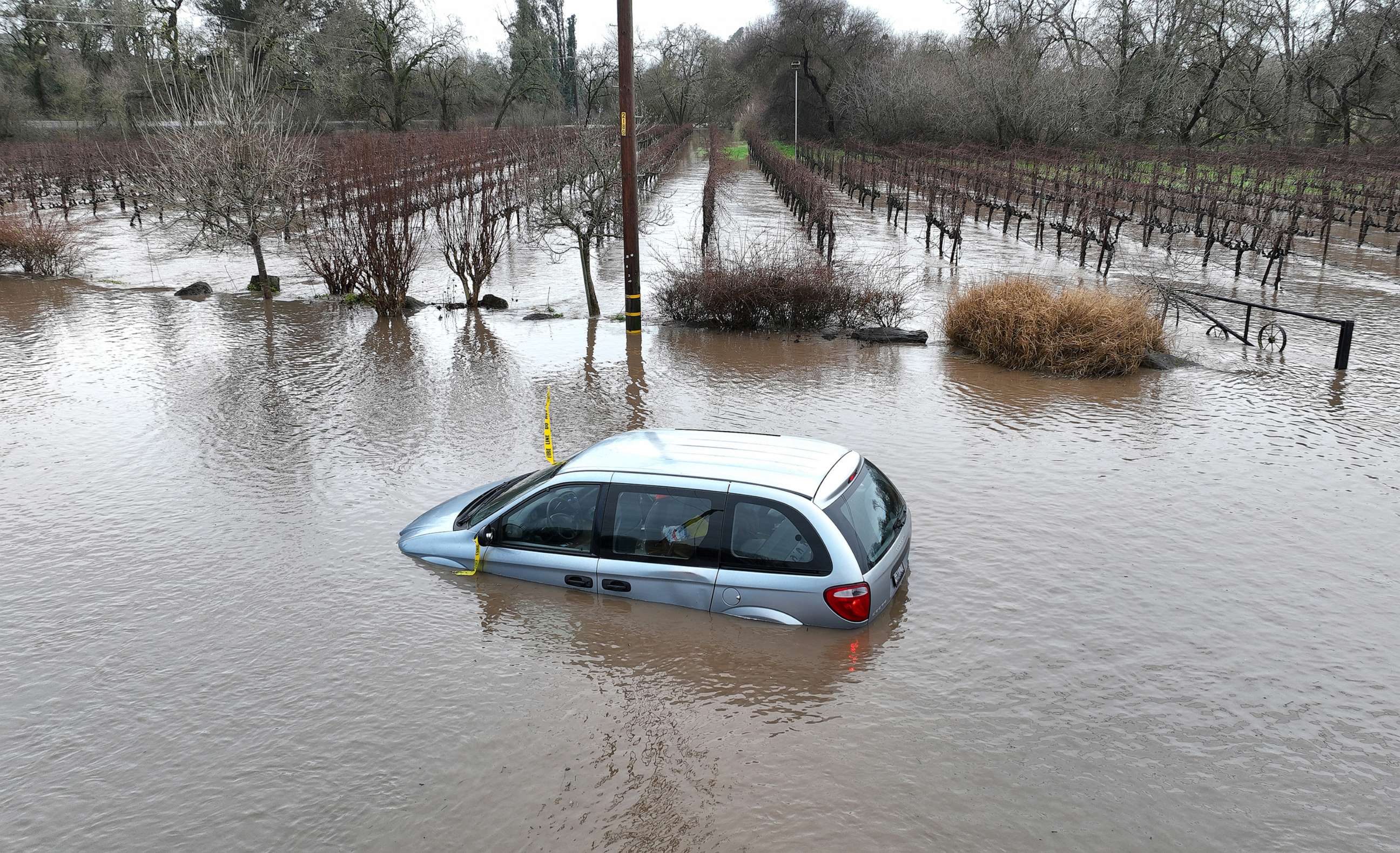 PHOTO: A car is submerged in floodwater after heavy rain moved through the area, Jan. 9, 2023, in Windsor, Calif.