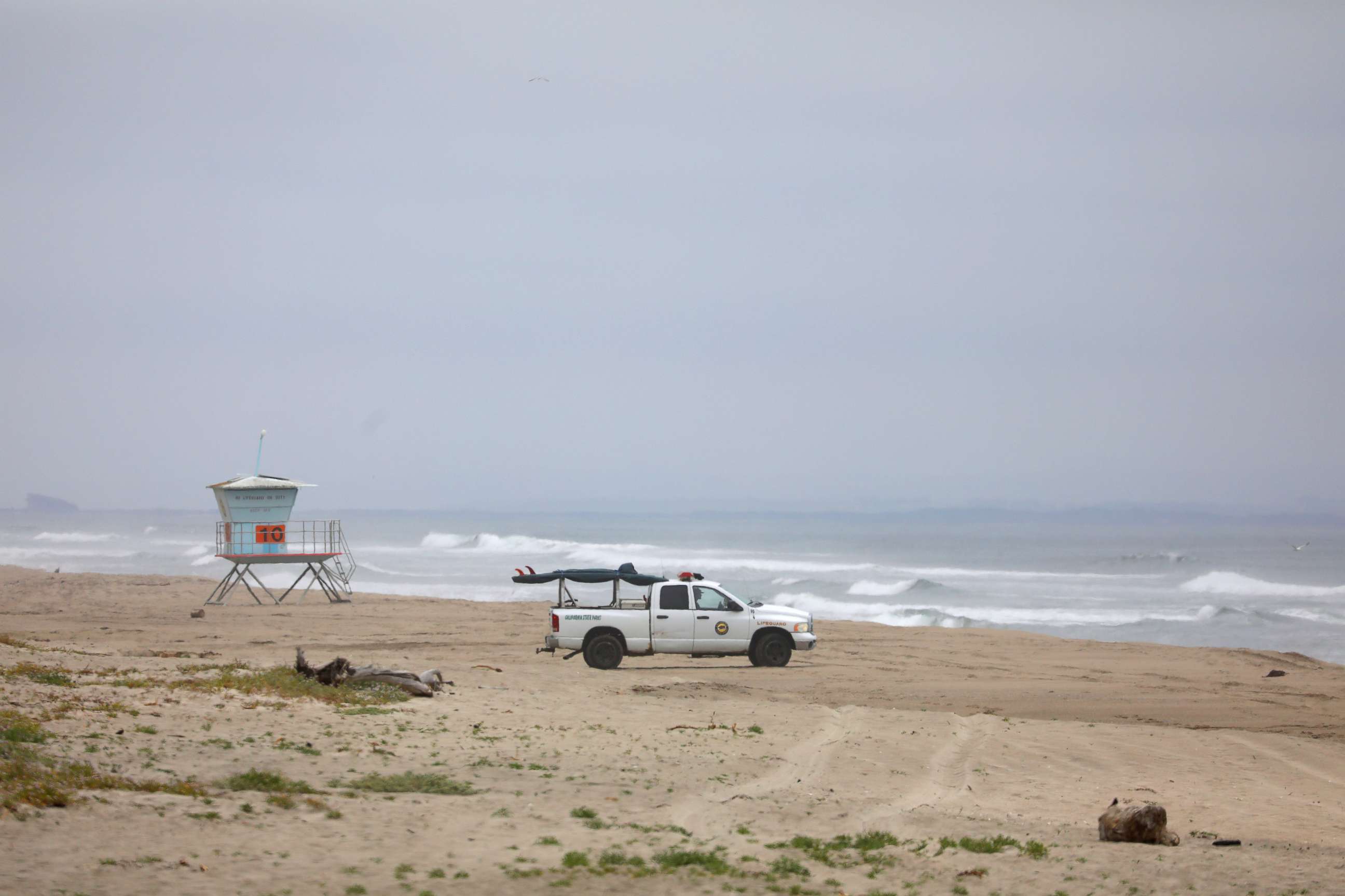 PHOTO: A California State Lifeguard vehicle patrols Manresa State Beach. May 10, 2020, in Santa Cruz County.