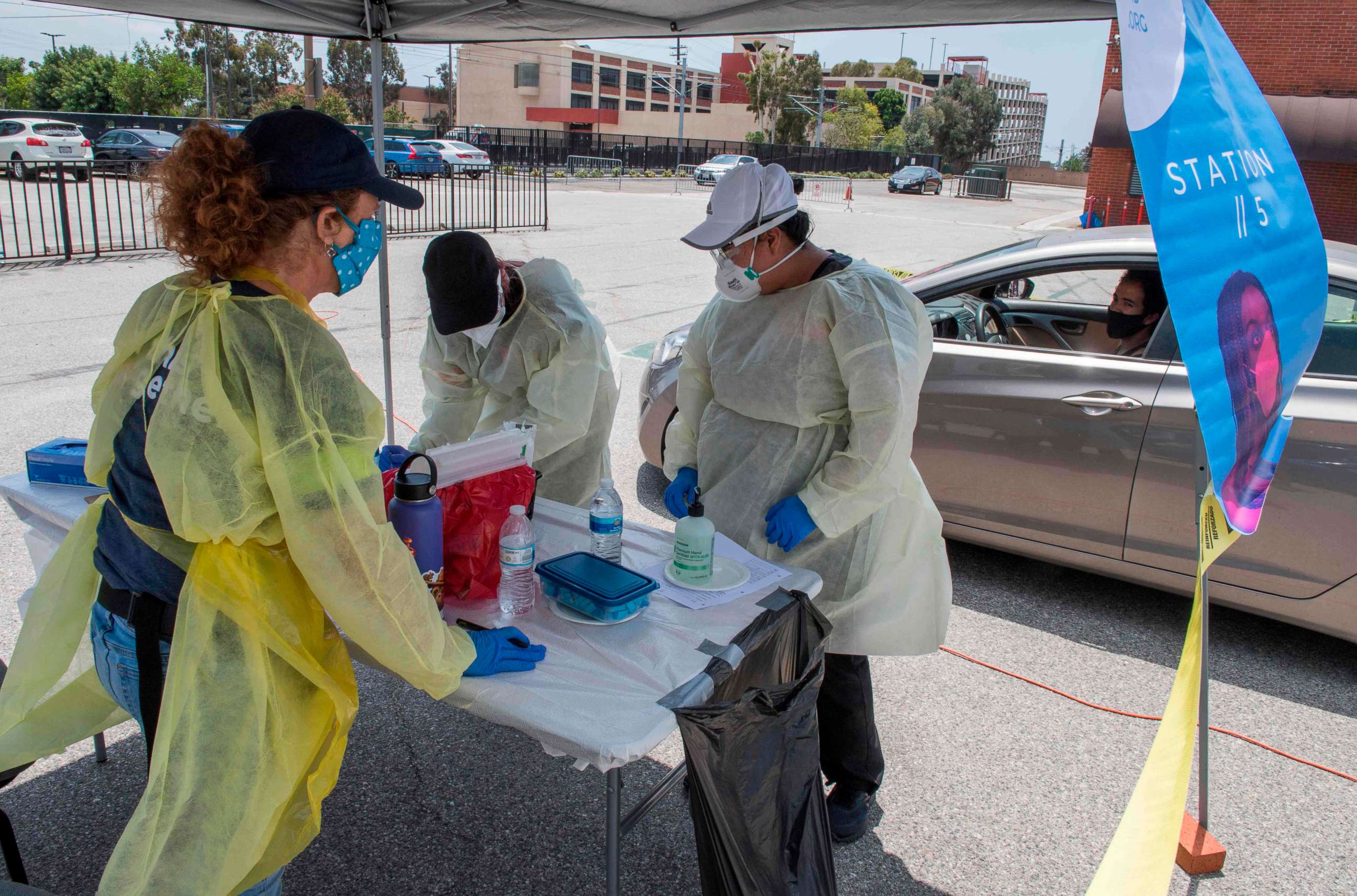 PHOTO: Medical staff from myCovidMD provide free COVID-19 virus antibody testing in observance of Juneteenth at the Faith Central Bible Church, in the predominately African American city of Inglewood, California, June 19, 2020.
