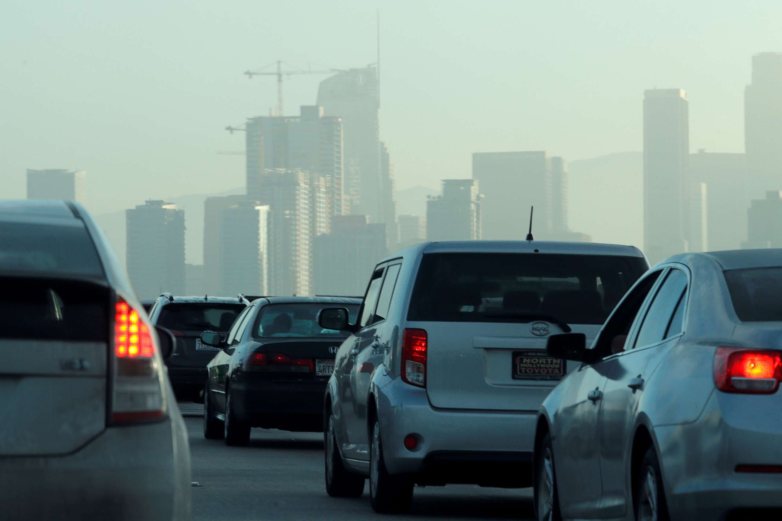 PHOTO: Commuters navigate early morning traffic as they drive towards downtown Los Angeles, July 22, 2019.