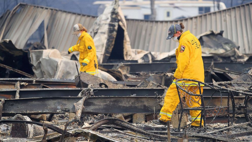Firefighters search Ridgewood Mobile Home Park in the aftermath of the Camp Fire in Paradise, Calif., Nov. 12, 2018.