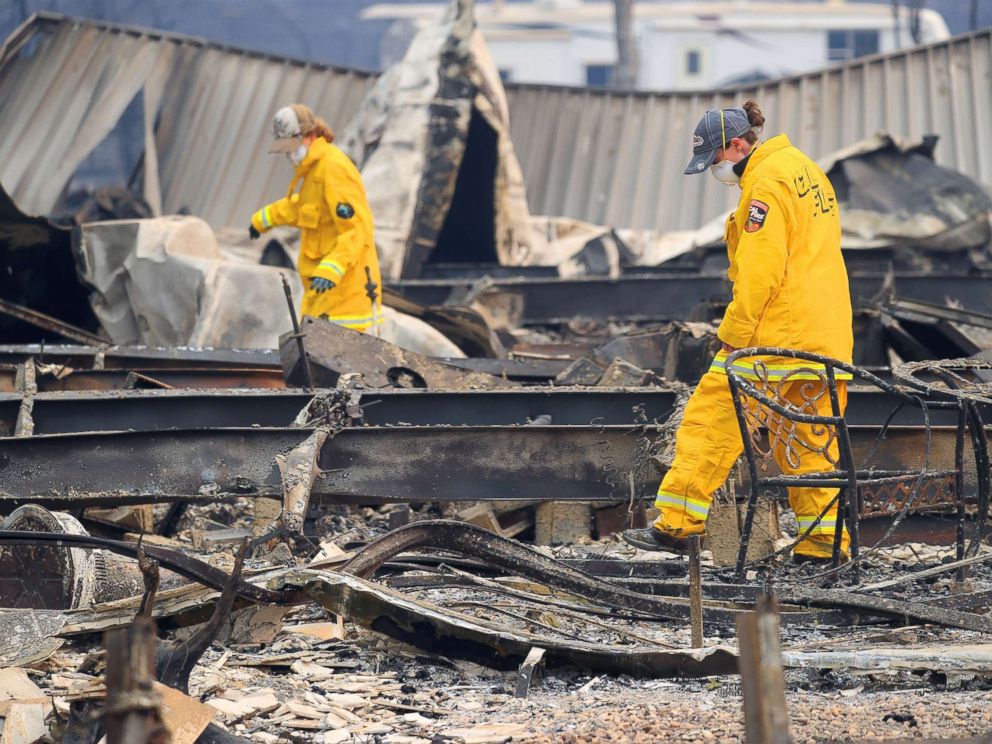 PHOTO: Firefighters search Ridgewood Mobile Home Park in the aftermath of the Camp Fire in Paradise, Calif., Nov. 12, 2018.