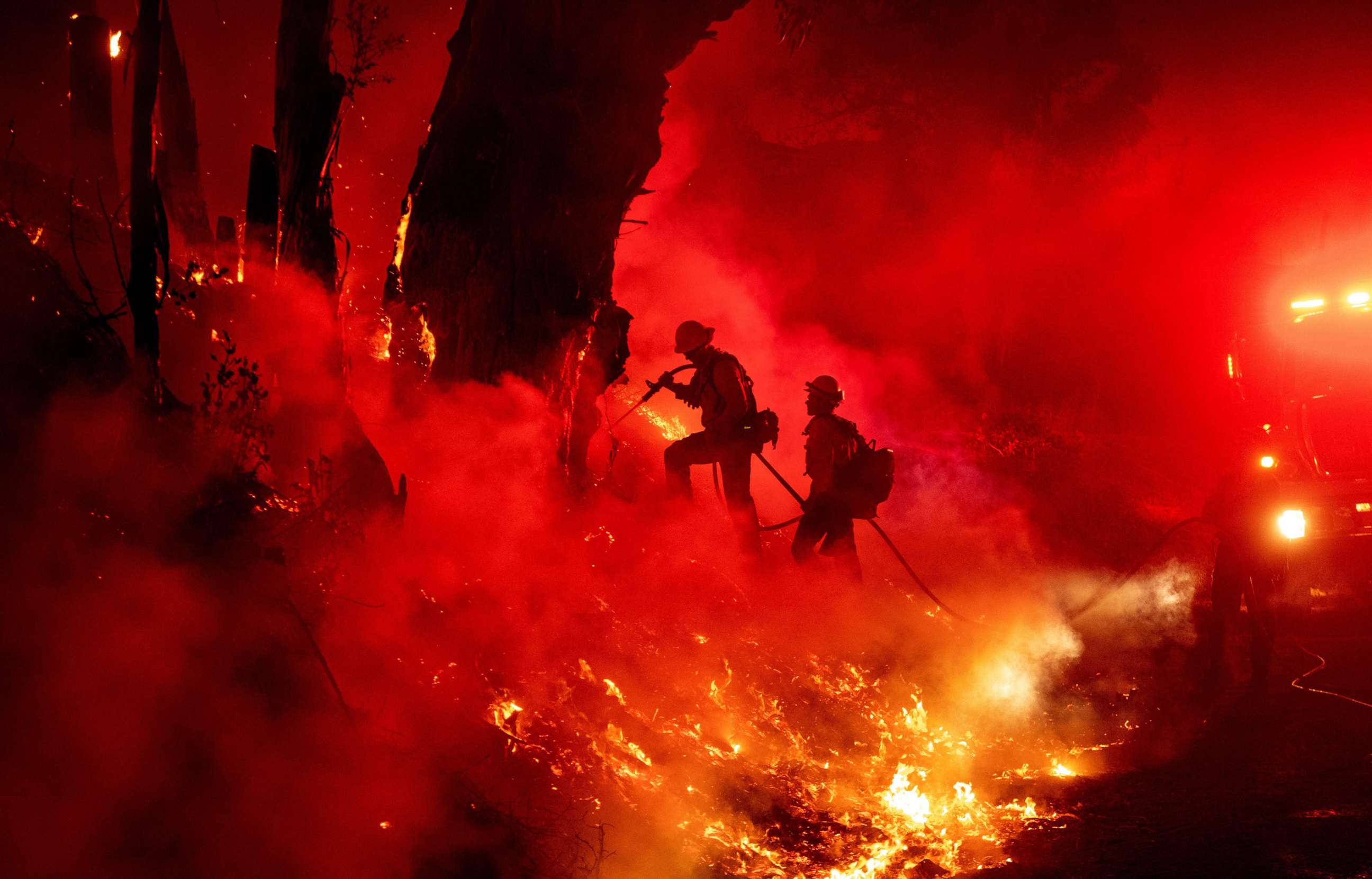 PHOTO: Firefighters work to control flames from a backfire during the Maria fire in Santa Paula, Calif., Nov. 1, 2019.
