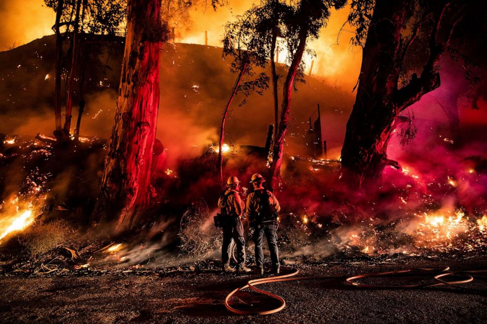 PHOTO: Firefighters work at containing the Maria fire spreading in the hills near Ventura, North West of Los Angeles, Nov. 1, 2019.