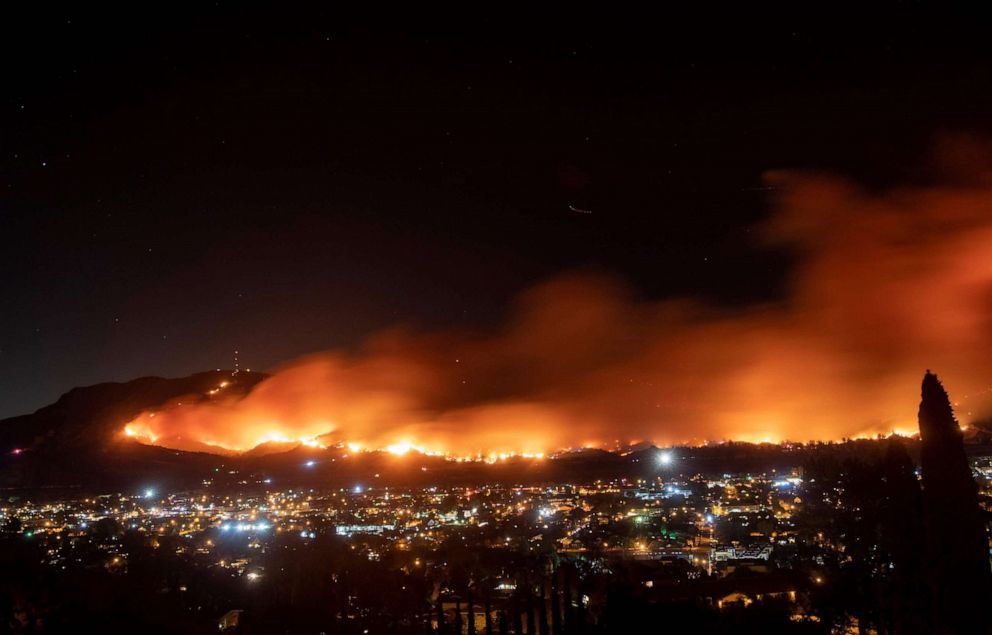 PHOTO: A long exposure photo shows the Maria fire as it races across a hillside in Santa Paula, Calif., Nov. 1, 2019.
