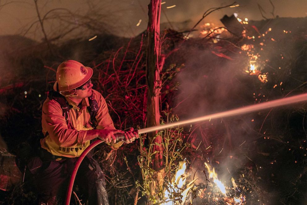 PHOTO: Firefighters control a backfire they set at the Maria Fire, Nov. 1, 2019 near Somis, Calif.