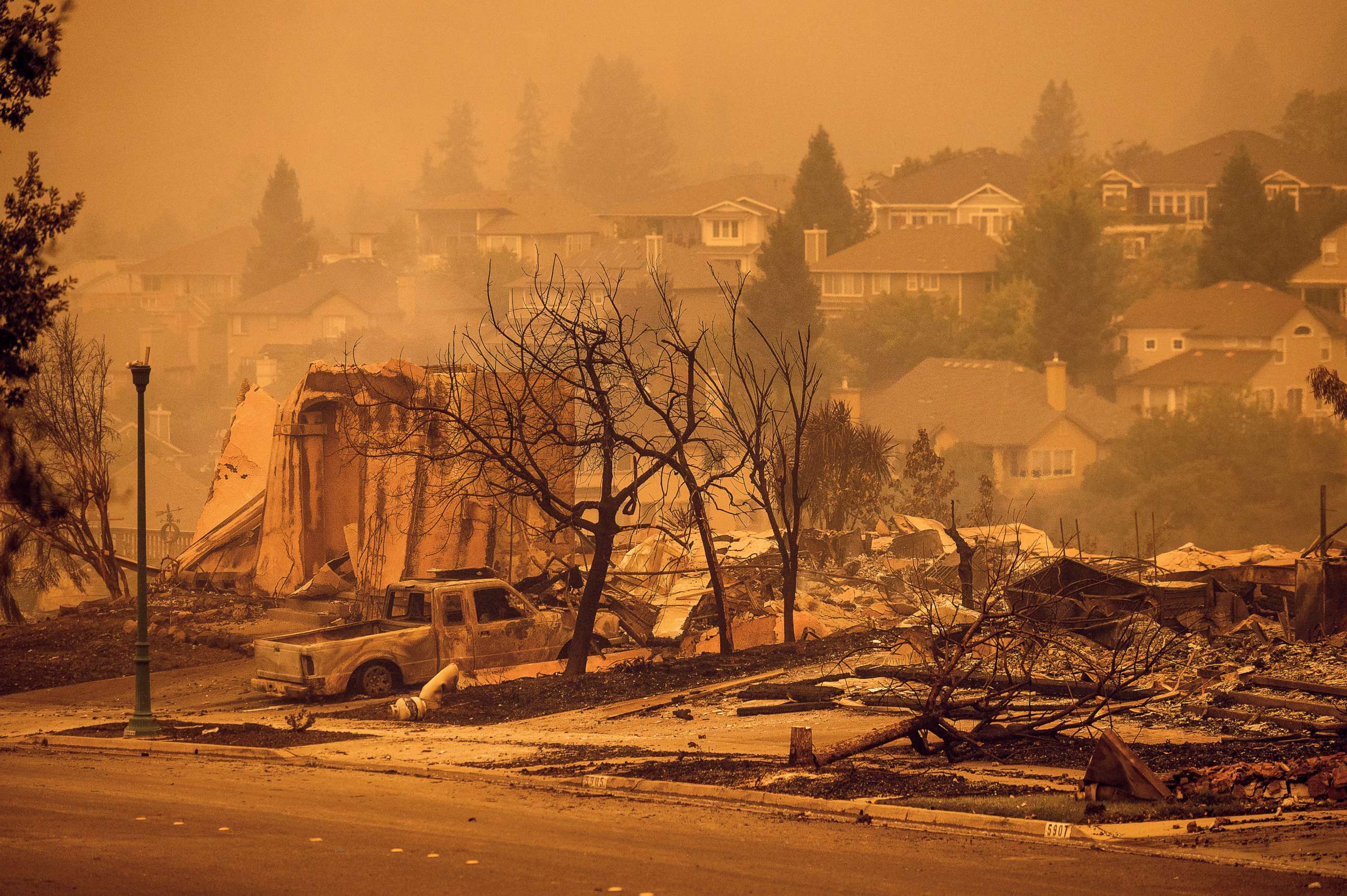 PHOTO: Houses leveled by the Glass Fire are viewed on a street in the Skyhawk neighborhood of Santa Rosa, Calif., Sept. 28, 2020.